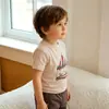 Camiseta de Manga Curta para Bebê Estilo Escandinavo Roupas de Verão Tops Infantis 2026 Roupas Infantis Meninos e Meninas Camiseta de Manga Meia-Manga Estampa de Desenho