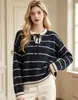 Nuevo suéter de punto a rayas de otoño europeo y americano para mujer, estilo casual versátil holgado, diseño de cuello redondo, top de manga larga