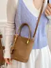 Bolsa transversal de moda coreana muito estilosa, nova bolsa de mão para o início do outono de 2026, bolsa tipo balde da moda, bolsa de ombro única e moderna