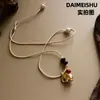 Collar de Elefante Tótem de Ágata Moda Vintage, Lujo Ligero Nicho Sensación de Alta Gama, Cadena Versátil para Suéter con Cuerda Trenzada Hecha a Mano con Cuentas