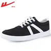 Tênis de lona masculino Warrior 2026 novos sapatos da moda de primavera para homens tênis esportivos casuais versáteis para homens