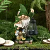 Nuevo Gnomo de Lectura Flocado Transfronterizo Adornos de Resina Linterna de Balcón de Patio Escultura Solar de Jardín Enano