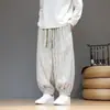 Calça de veludo cotelê pantalona com punhos elásticos, adequada para primavera e outono, apresentando estampa xadrez, design retrô estilo chinês e um corte solto e oversized para homens