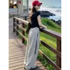 Traje Casual de Moda para Mujer, Nuevo Estilo Verano 2026, Top Negro de Manga Corta, Pantalones de Pierna Ancha de Cintura Alta, Conjunto de Dos Piezas Adelgazante Estilo Coreano