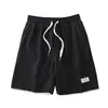 Pantalones cortos de gofre de verano transfronterizos nuevos para hombre, modernos y versátiles, adecuados para usar al aire libre, estilo juvenil simple, pantalones cortos hasta la rodilla con cordones para hombre