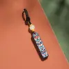Sándalo Tallado Placa de Color Pintada a Mano Tendencia Nacional Llavero de Coche de Sándalo Tallado Placa Segura y Sonora Colgante Decorativo para Mochila de Pareja