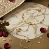 Pulseira Taina Cruzada Europeia e Americana em Ouro 18K Cravejada com Diamantes, Toque de Luxo Leve e Sofisticado, Joia Mais Vendida na Amazon para Mulheres Atacado