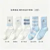 Calcetines jacquard con estampado de oso de lana australiana para mujer, calcetines cálidos de otoño e invierno hasta la pantorrilla, calcetines de casa con rayas y lazo, Zhuji