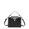 Nuevo bolso de mano decorativo simple en forma de V 2026, moderno y elegante, bolso tipo cubo de un solo hombro cruzado para mujer