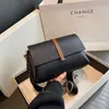 Bolso cruzado para mujer 2026 nuevo versátil para el trabajo bolsa cuadrada pequeña estilo coreano moderno diseño simple bolso de hombro bolso cruzado para mujer