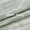 Tejido de gofre de dos colores de una cara 220g Poliéster Rayón Tejido de punto ligero de dos colores Tela para ropa casual Traje