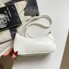 Bolso de axila Ruien de moda para mujer, nueva colección otoño 2026, nicho, elegante, casual y único bolso pequeño cuadrado de hombro