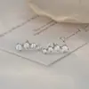 2025 Novos Brincos de Design de Nicho Estilo Coreano Simples Brincos de Uma Linha Brincos para o Dia a Dia Atacado