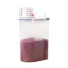 Cubo de arroz portátil con taza medidora, tarro de almacenamiento multi-grano para cocina, tarro de plástico sellado a prueba de humedad, tarro de almacenamiento de alimentos de 2 kg, venta directa