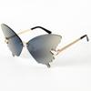 Tendencia europea y americana personalidad divertida fiesta gafas de sol coloridas sin montura recorte forma de mariposa gafas de comercio exterior transfronterizo