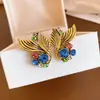 Pendientes de botón redondos estilo cola de pez incrustados con diamantes vintage, pendientes de nicho retro a la moda, pendientes de lujo ligero de alta gama para mujer