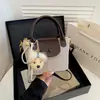 Bolso Cubo de Mano con Diseño Retro de Nicho Verano 2026 Nuevo Bolso de Hombro de Color Sólido Bolso Cruzado de Moda Casual