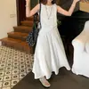 Conjunto casual de dos piezas moderno y versátil para personas petite: conjunto de blusa sin mangas a rayas con amarre y falda