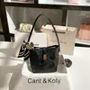 Una generación de bolso tipo cubo pequeño de alta calidad estilo chino nuevo 2025 bordado de encaje para el trabajo 1 bolso de axila al por mayor