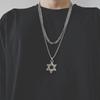 Collar de cruz apilada de doble capa de hip-hop transfronterizo europeo y americano para hombre, diseño de nicho moderno, cadena cubana con sentido de acero de titanio a juego.