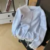Suéter de estilo coreano, dulce y juvenil, con ribete de encaje, fruncido en la cintura y cierre de corbata al frente para mujer, un top holgado, estilizado y versátil de cuello redondo, perfecto para la primavera