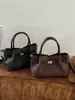 Bolso de Mano de Felpa y Gamuza para Mujer 2026 Nuevo Estilo Moderno Tacto de Alta Gama Bolso de Hombro Único Bolso Cruzado Tipo Cubo de Felpa y Gamuza Exquisito