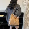 Bolsa de Camurça Retrô Relaxada para Mulheres 2025 Nova Versátil para o Dia a Dia Bolsa de Ombro Transversal Bolsa Tote de Grande Capacidade