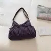 Bolso de hombro a cuadros retro estilo coreano, nueva moda 2026, con detalle de lazo, ofreciendo un look relajado y casual, adecuado para uso en exteriores