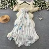 Vestido Longo Estilo Férias com Gola Halter Floral Costas Abertas para Mulheres Verão Babado Irregular Sem Mangas Cintura Marcada Estilo Fada