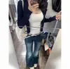 Conjunto de duas peças de tricô estilo coreano, puro e sedutor, para mulheres, nova coleção primavera 2026, top de beleza única
