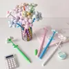 Temporada de regreso a clases flor de tela personaje de dibujos animados bolígrafo de gel para escribir, bolígrafo de girasol creativo para estudiante, bolígrafo de regalo