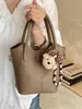 Bolso de Mano de Lujo de Gama Alta de Nicho para Mujer, Nueva Moda Primavera 2026 Bolso Cubo de Hombro Cruzado para el Trabajo
