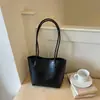 Bolso tote casual simple nuevo de principios de otoño 2026, bolso de hombro de alta estética y calidad, bolso de hombro de gran capacidad para el trabajo, moderno