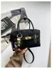 Bolso de mano Boston de gamuza vintage transfronterizo para mujer, nuevo bolso nicho de alta moda tipo almohada, bolso de hombro y bandolera
