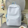 Mochila de campus para meninas, versão coreana, design xadrez simples, mochila casual de grande capacidade para viagens para alunos do ensino fundamental II e médio