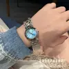 Nuevo Libro Rojo Pequeño TikTok Ola Hogar Corazón Luna Serie Azul Hielo Flor de Cerezo Luna de Daifa Fase Lunar Moda Jialan Reloj de Cuarzo para Mujer
