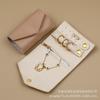 Fu Chen PU portátil multifuncional joyería rollo pequeño aretes anillo aretes collar pulsera bolsa de almacenamiento logo imprimible