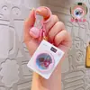 Chaveiro Criativo de Mini Máquina de Lavar Roupa Desenho Animado Brinquedo Divertido para Alívio do Estresse com Som Pingente de Mochila Presente