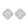 Pendientes de Plata de Ley s925 de Alta Gama Trébol de Cuatro Hojas Moissanita Flor Pequeña Pendientes de Botón Súper Brillantes Joyería para Mujer Venta Caliente Transfronteriza Europea y Americana