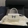 Bolso de Mano con Lazo de Metal 2026, Bolso Mini Baguette Sencillo con Solapa, Bolso Pequeño de Hombro Cruzado Estilo Suave