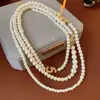 2025 Nuevo Collar Retro de Perlas Apiladas Cadena para Suéter de Lujo Ligero Gama Alta Nicho Versátil para el Trabajo al Aire Libre Venta al por Mayor
