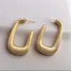 Pendientes de cobre cepillado chapados en oro de alta gama con diseño hueco en forma de U, pendientes simples y versátiles para mercados transfronterizos europeos y americanos, venta al por mayor