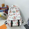 Mochila de Comercio Exterior para Mujer Gran Capacidad Doble Hombro Estampado Lindo Ultraligera Resistente a la Suciedad Estilo Escolar Alta Apariencia Mochila Estudiantil