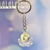 Nuevo Colgante Creativo de Bolsa con Cara Sonriente de Pulpo Brillante Dibujo Animado Pequeño Regalo Llavero de Moda Anillo de Llave