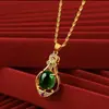 Nuevo colgante de pavo real fénix trébol de cuatro hojas chapado en oro de latón, accesorio de joyería de moda retro de celebridad de internet, venta directa de fábrica