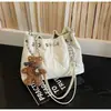 Bolso Retro de un Solo Hombro para Debajo del Brazo Tendencia Primavera 2026 Nuevo de Gran Capacidad Moderno y Único Bolso de Cuerda Bolso Cruzado con Cadena