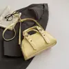 Bolsa de Bolos de Mano para Mujer 2026 Primavera Nueva Moda Estilo Coreano Nicho Bolsa Almohada Ins Bolso de Hombro Cruzado