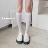 Verano nuevo calcetines blancos y negros jk calcetines hasta la rodilla rombo delgados estilo universitario japonés calcetines hasta la pantorrilla mujeres fabricantes mayoreo