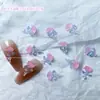 Artículo popular de celebridad de Internet paquete de material de decoración para arte de uñas mar estrellado de ensueño mezcla de pequeñas decoraciones coloridas con forma de corazón y estrella luminosas para arte de uñas