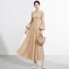 Vestido Miyake com mangas bufantes de alta qualidade, cor sólida, cintura alta, saia evasê que afina a silhueta, elegante e estiloso, vestido longo versátil